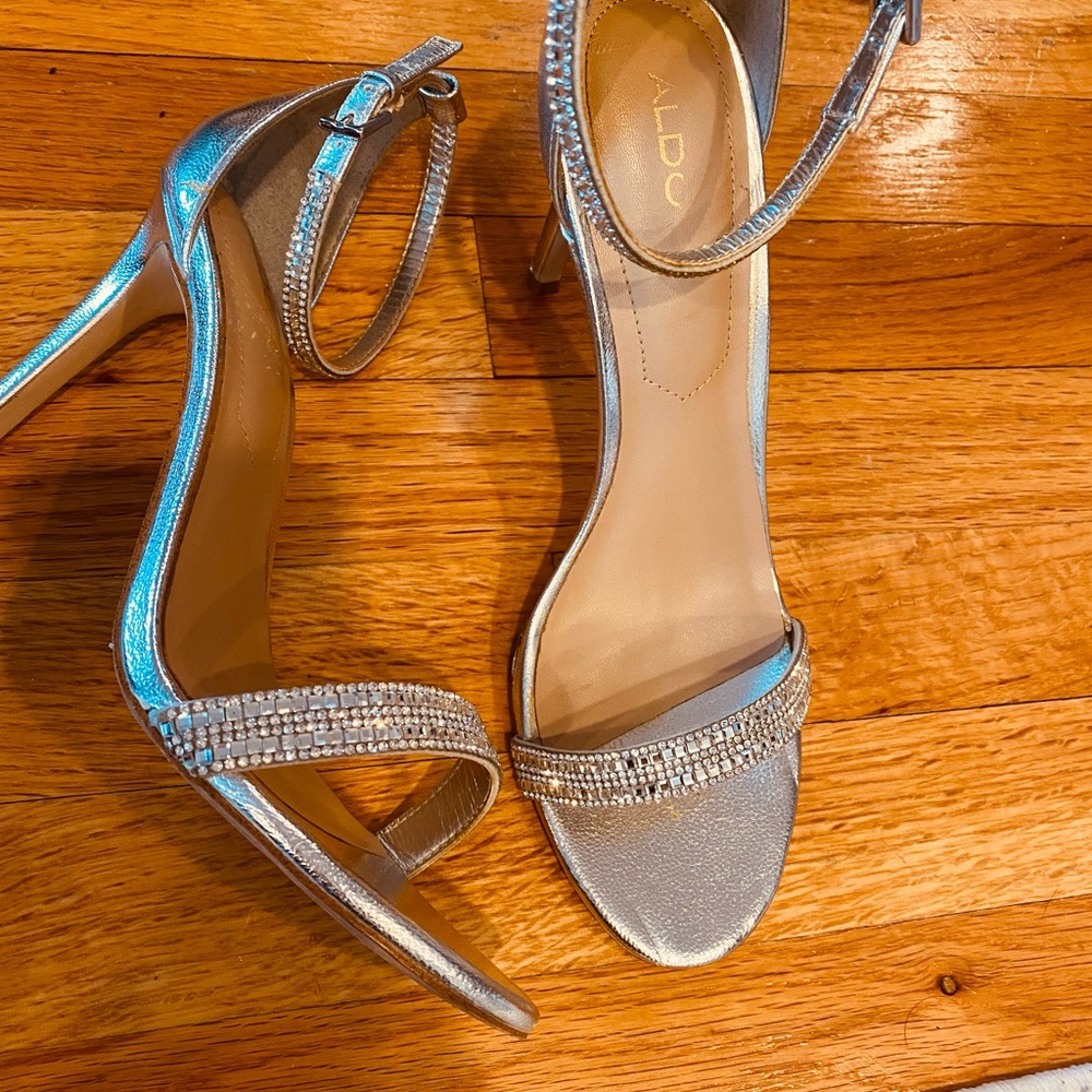 Gorgeous silver rhinestone evening heels. 4 inch heel and only wore once.